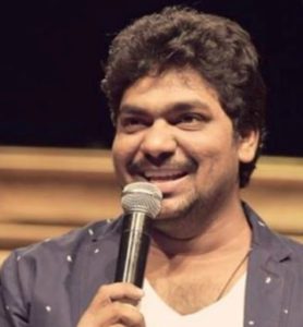 zakir khan in action during standup comedy, all about zakir khan